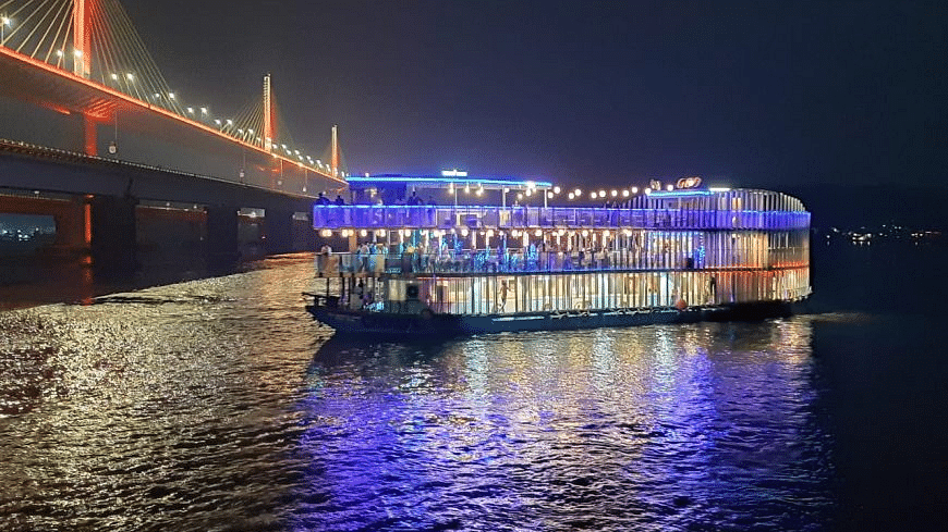 A cruise in the middle of a sea with lights